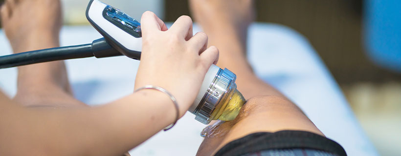 patient receiving shockwave therapy in Sacramento for pain relief